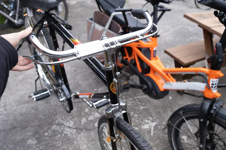 Rigid brake system on a Bheem single speed bike in the shop backyard