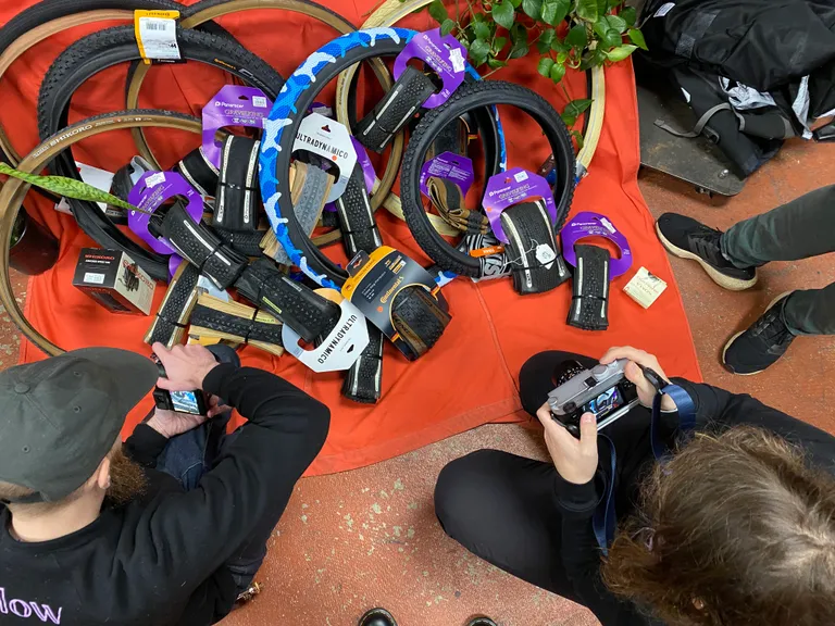 Emily and Ben photographing tires