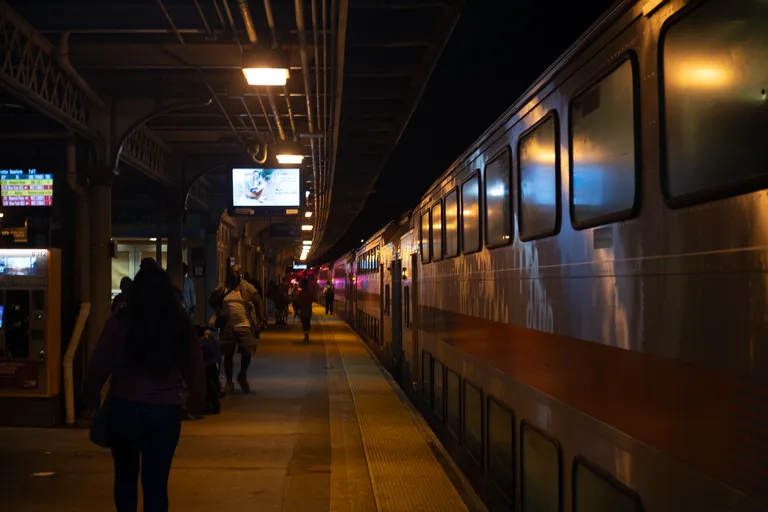 An NJT Multilevel train sits at the platform at Trenton on track 1